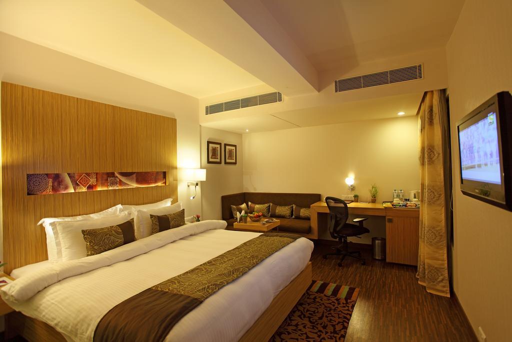 Comfort Inn Legacy Rajkot Habitación foto